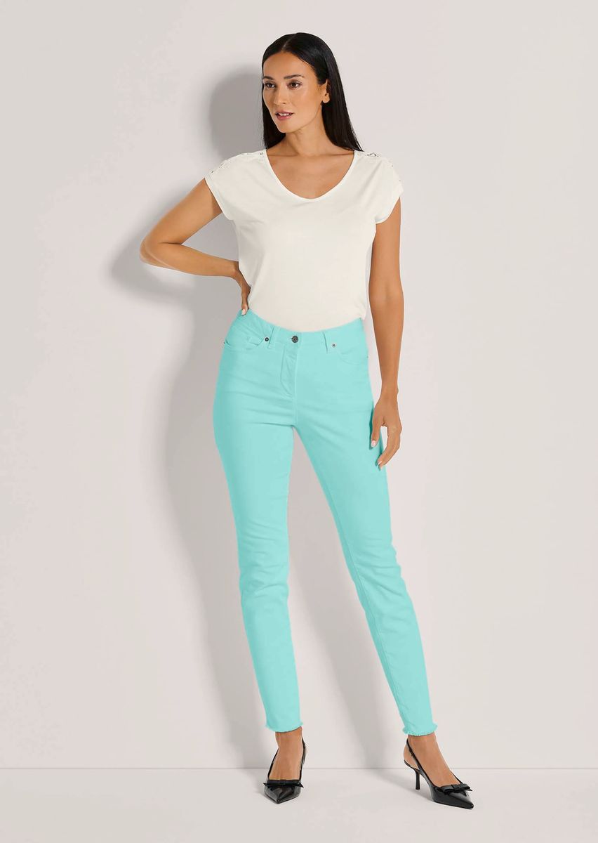 Skinny-Jeans mit feinem Fransensaum