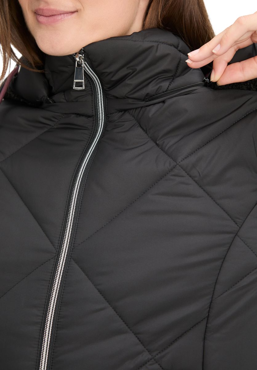 Lange Steppjacke mit Kapuze