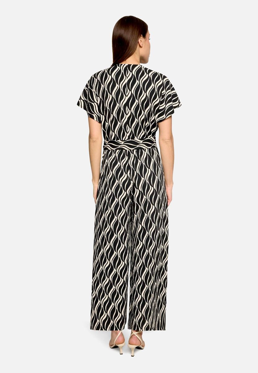 Jumpsuit in Wickeloptik mit Grafikmuster