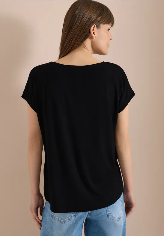 Strukturmix-Bluse mit Knotendetail