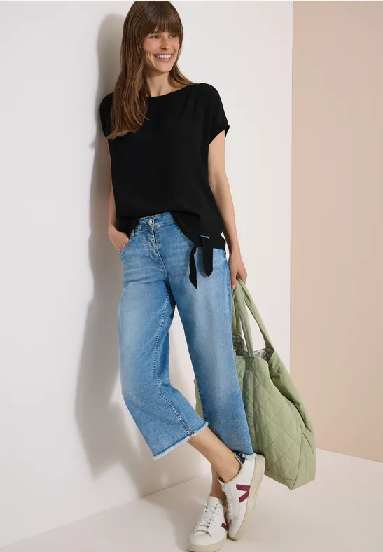 Strukturmix-Bluse mit Knotendetail