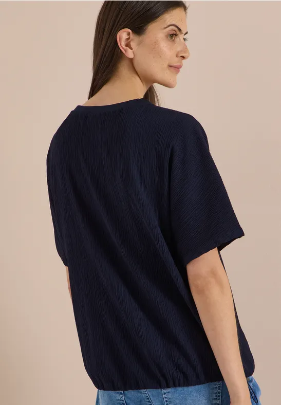 Strukturiertes Blusenshirt mit überschnittenen Schultern