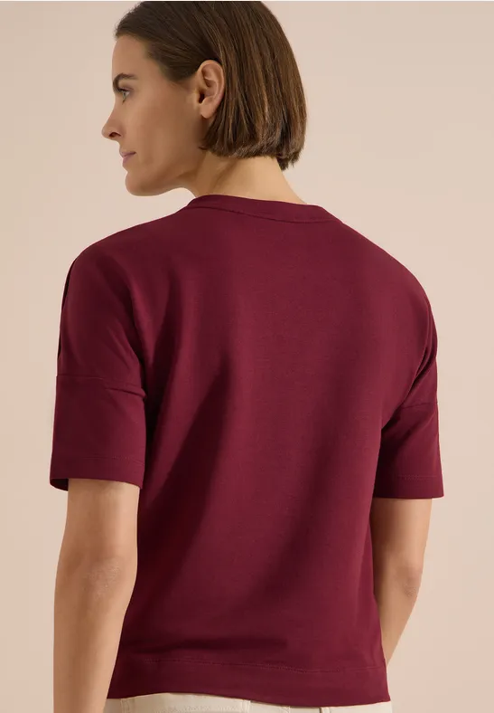 T-Shirt mit dekorativen Schulterknöpfen