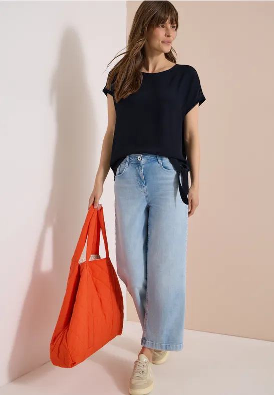 Strukturmix-Bluse mit Knotendetail