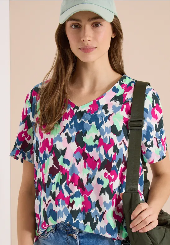 V-Ausschnitt-Blusenshirt mit abstraktem Muster