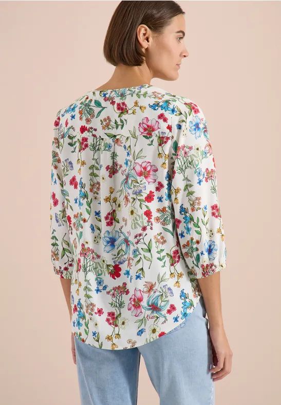 Fließende Tunika mit Blumenmuster