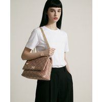 Elegante Klappentasche mit geometrischem Muster