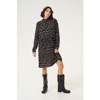 Kurzes Langarmkleid mit abstraktem Muster