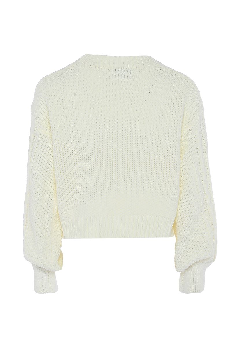 Grober Zopfstrickpullover mit Ballonärmeln