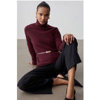 Eleganter Rollkragenpullover mit Gürtel