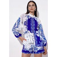 Romper mit Paisley-Muster und Gürtel