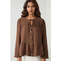 Musselin-Bluse mit Bindekragen und Schößchen