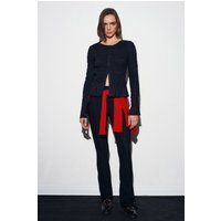 Strukturierte Strickbluse mit Schößchen