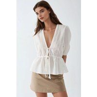 Strukturierte Peplum-Bluse mit V-Ausschnitt