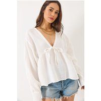 Strukturierte Bluse mit V-Ausschnitt und Schleife