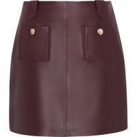 Hoch taillierter Leder-Mini mit Knöpfen