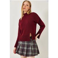 Lockerer Rollkragenpullover mit Schlitzen