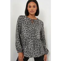 Peplum mit Leopardenmuster und Bindedetail