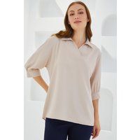 Locker geschnittene Bluse mit Polokragen