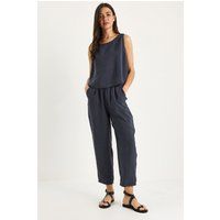 Minimalistisches Set aus Tunika und Karottenhose