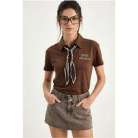 Besticktes Polohemd mit Wildlife-Print