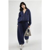 Salwar-inspirierte Fleece-Sweatpants mit schmalem Bein