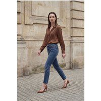 Hochtaillierte Skinny-Jeans mit Fransenabschluss