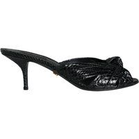 Elegante Mules aus Pythonleder