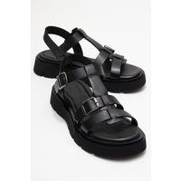 Moderne Leder-Plateausandalen mit Schnallen