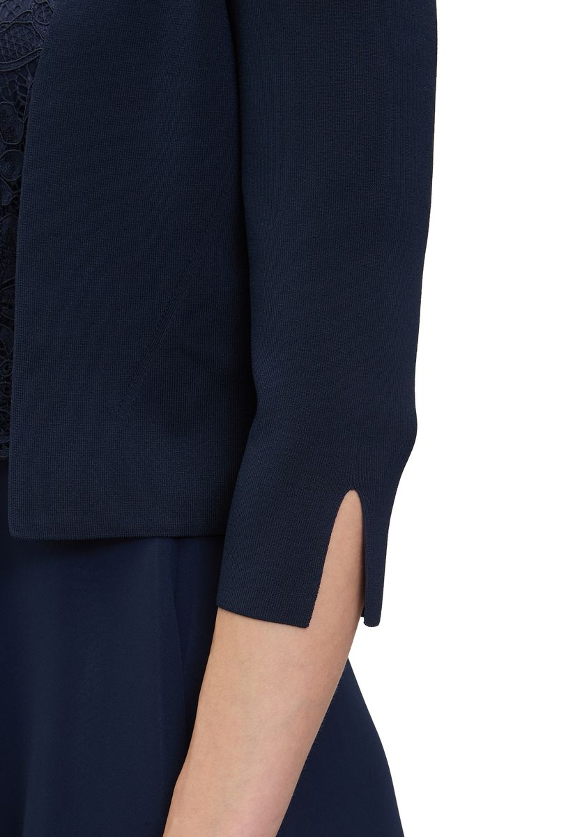 Glänzender Strickbolero mit Dreiviertelarm