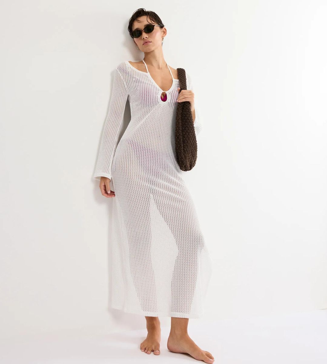 Transparentes Häkelstrick-Maxikleid für den Strand