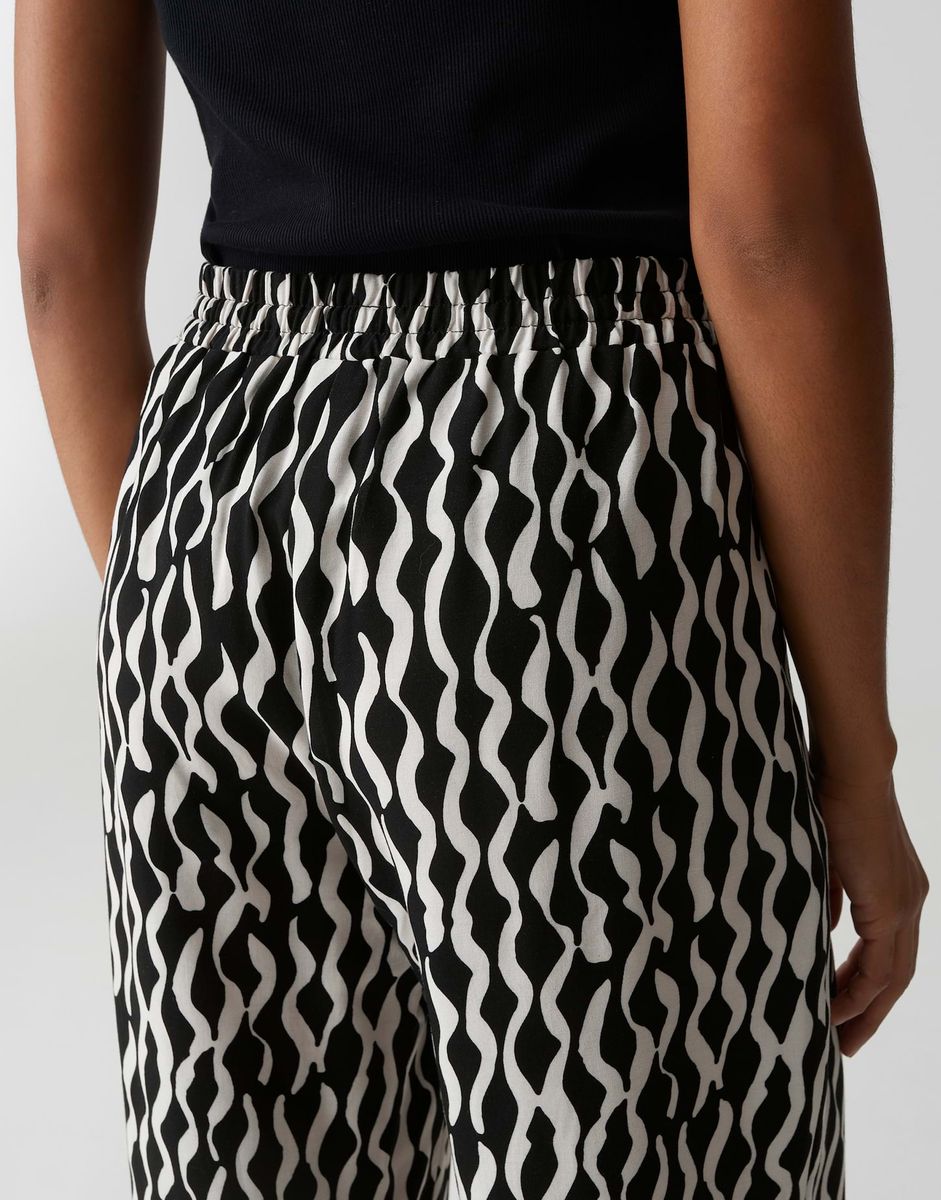 Fließende gemusterte Wide Leg Hose