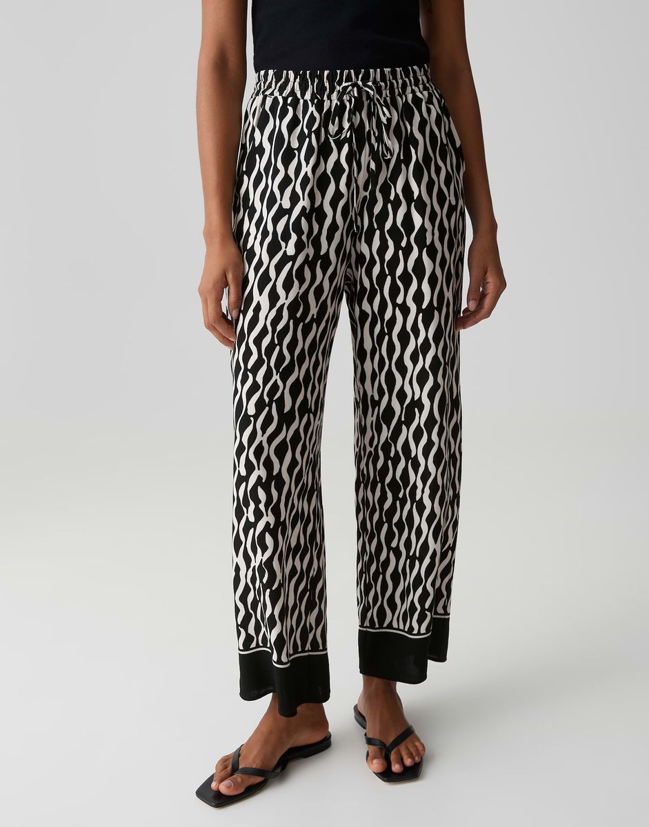 Fließende gemusterte Wide Leg Hose
