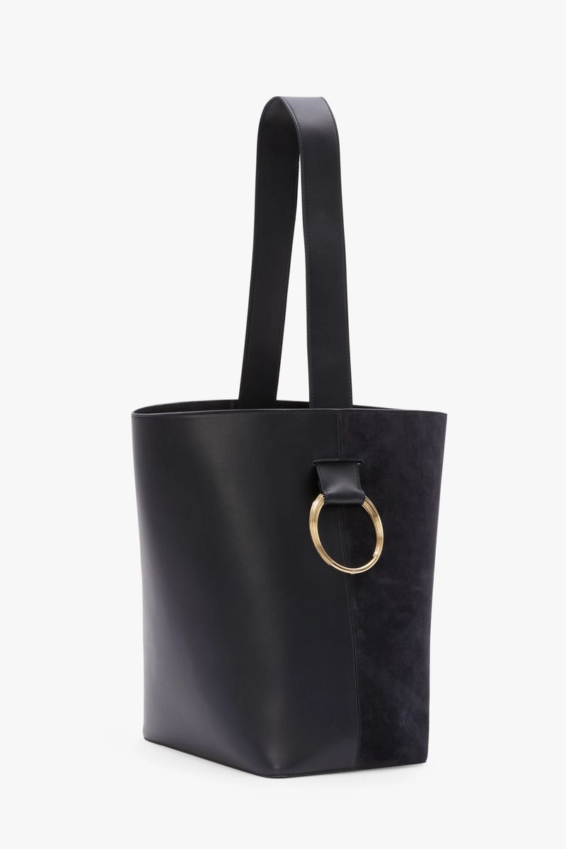 Minimalistische Beuteltasche aus Leder und Wildleder