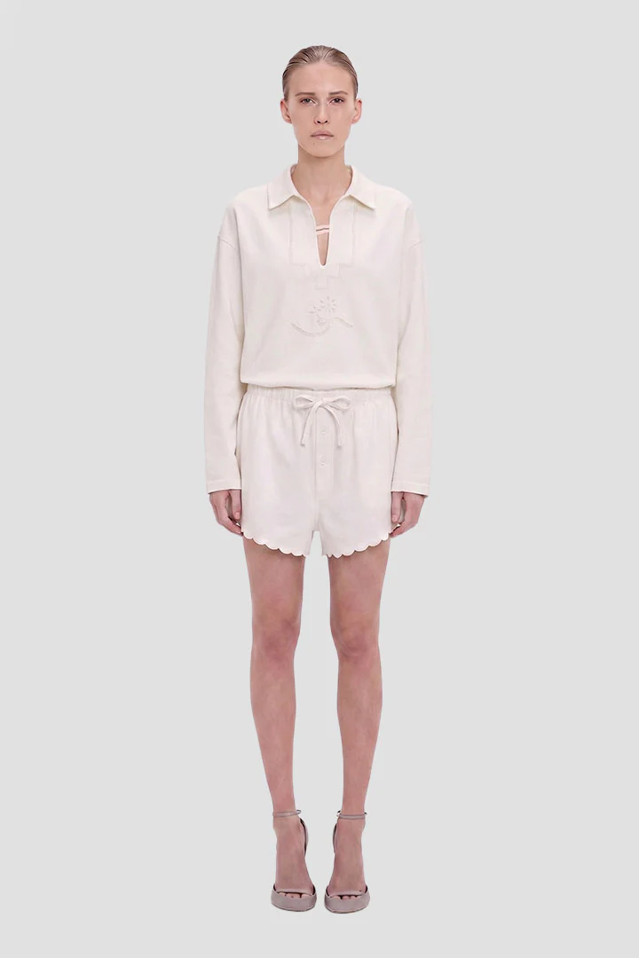 Bestickte Shorts mit Wellensaum