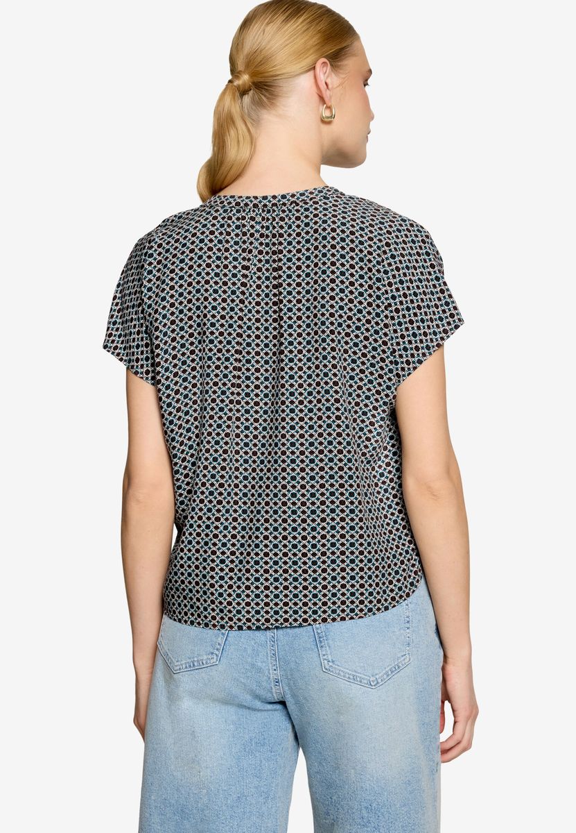 Bluse mit geometrischem Muster und V-Ausschnitt