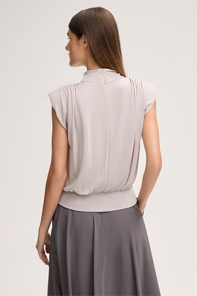 Elegantes Stehkragen-Top mit Schulterpolstern