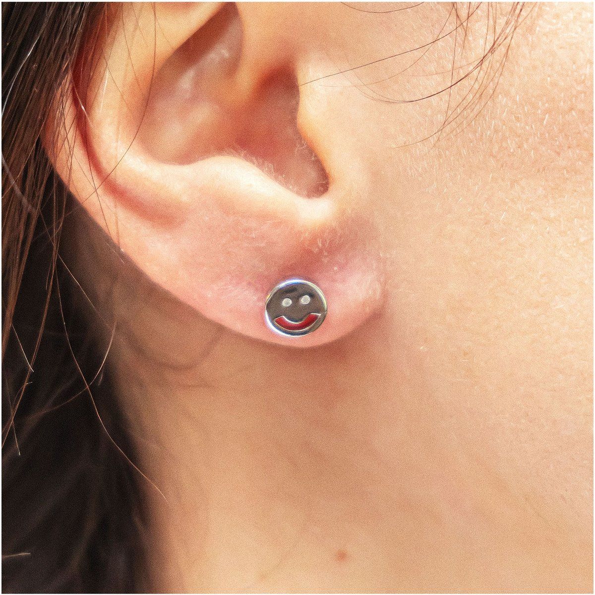Verspielte Smiley Gesicht Stecker
