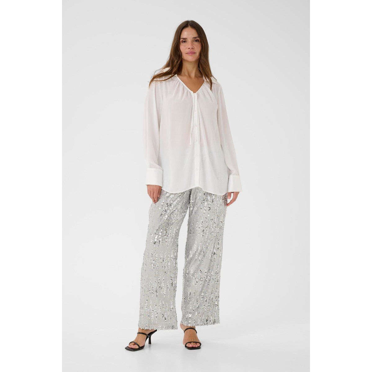Elegante Schluppenbluse mit breiten Manschetten