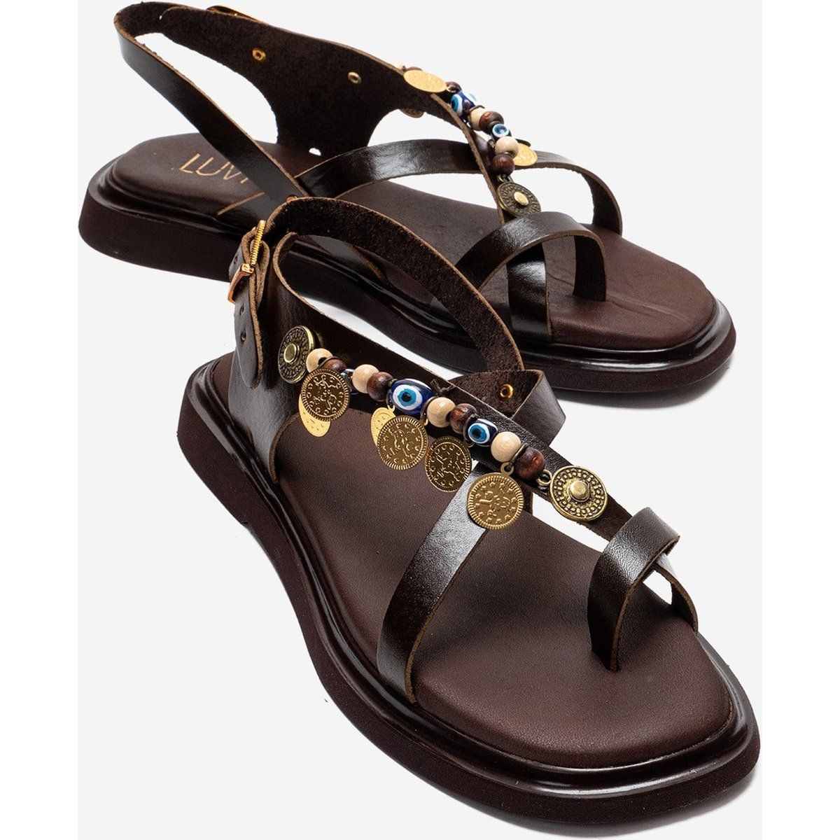 Kunstvolle Zehensteg-Sandalen aus Leder