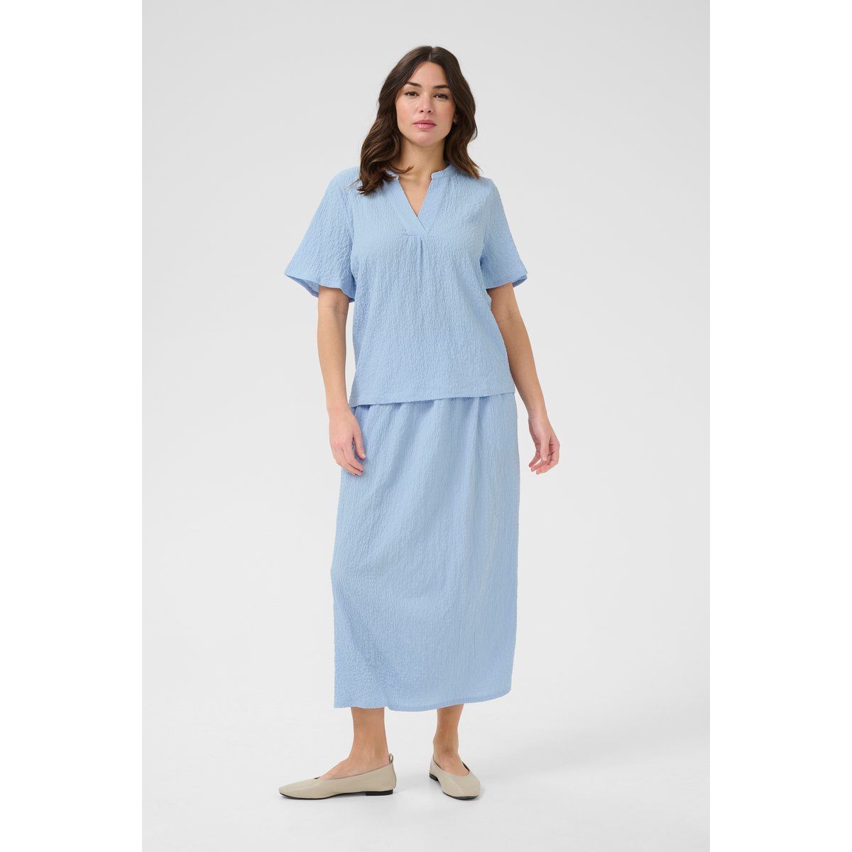 Strukturierte Bluse mit V-Ausschnitt