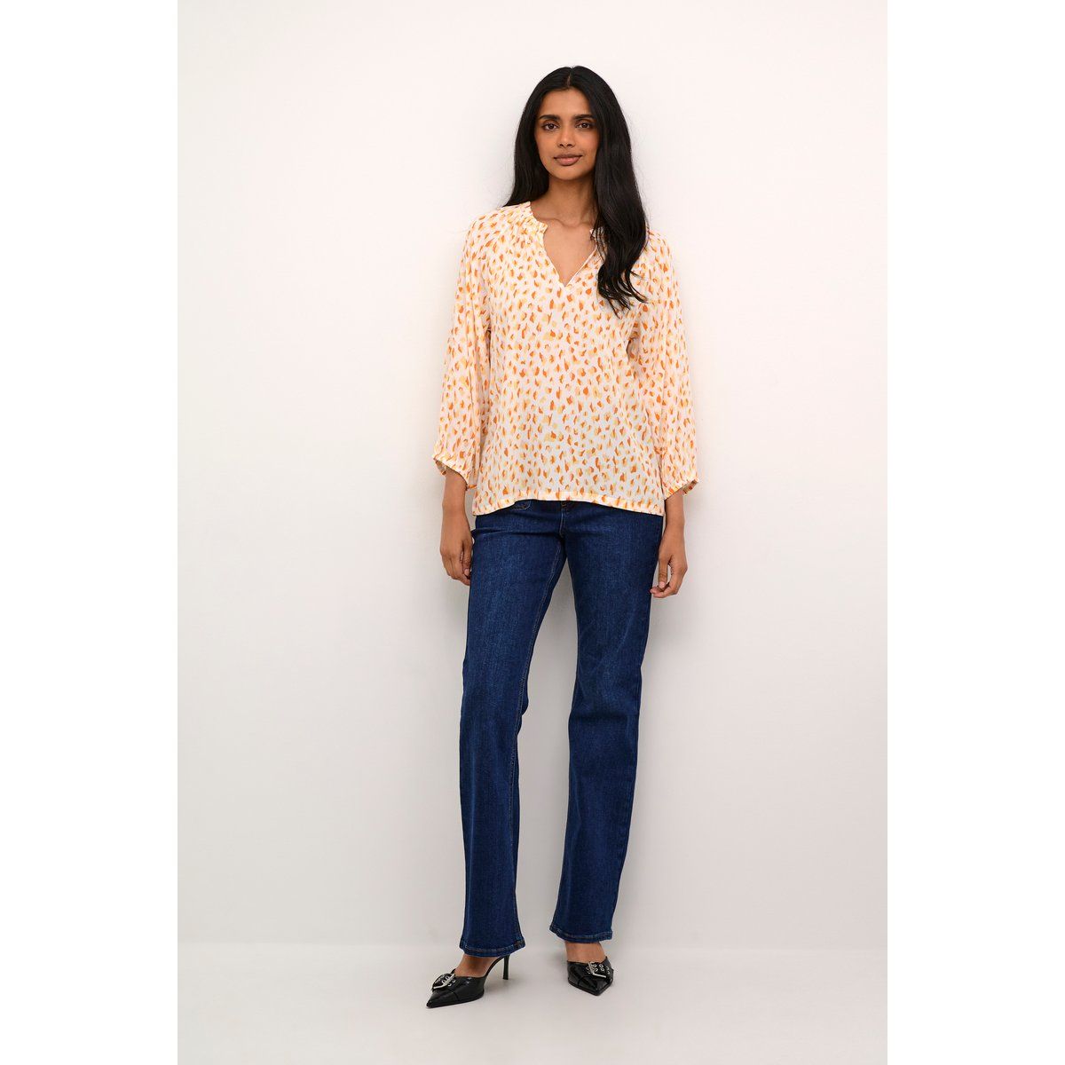 Fließende Bluse mit Grafikmuster