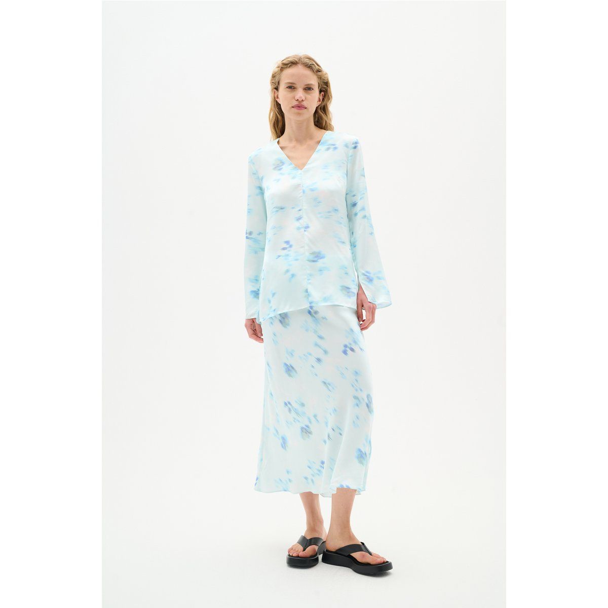 Fließender Midirock mit Blumenmuster