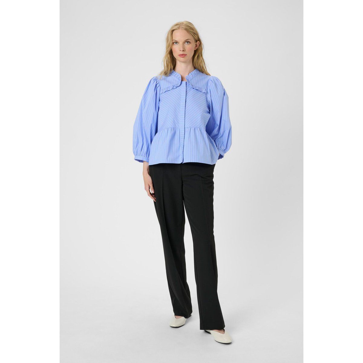 Feminine gestreifte Schößchen-Bluse