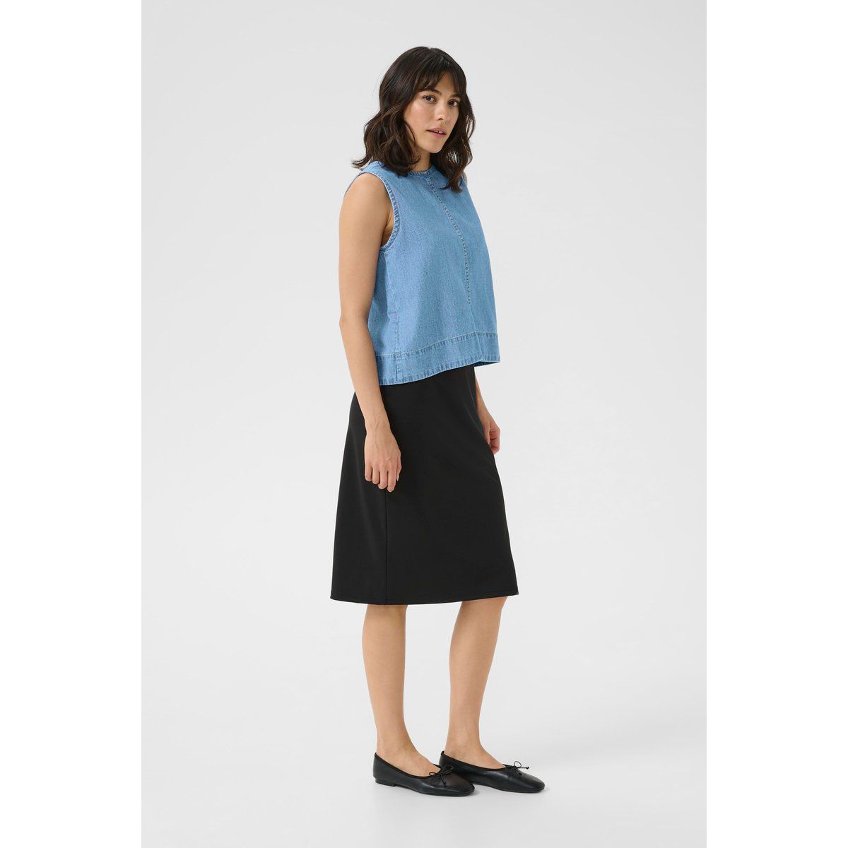 Minimalistische ärmellose Denim-Bluse