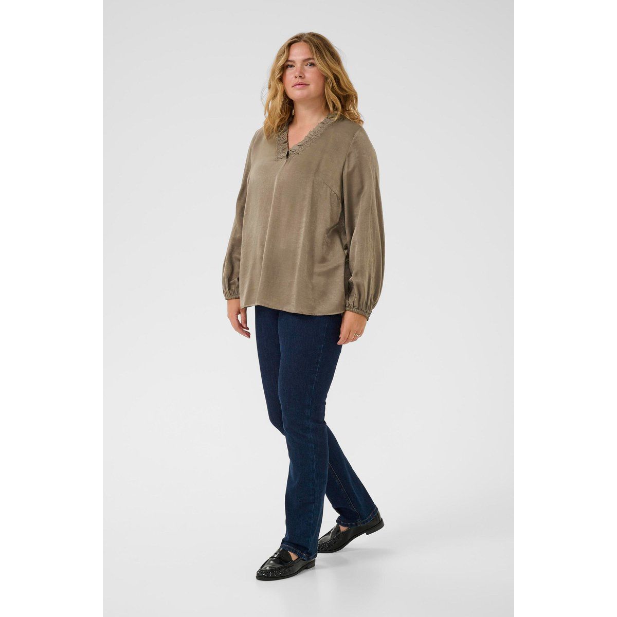 Elegante Bluse mit Rüschenv-Ausschnitt