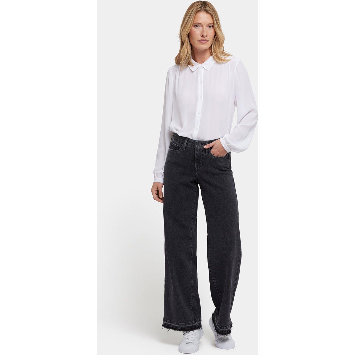 Weit geschnittene Jeans mit Fransen