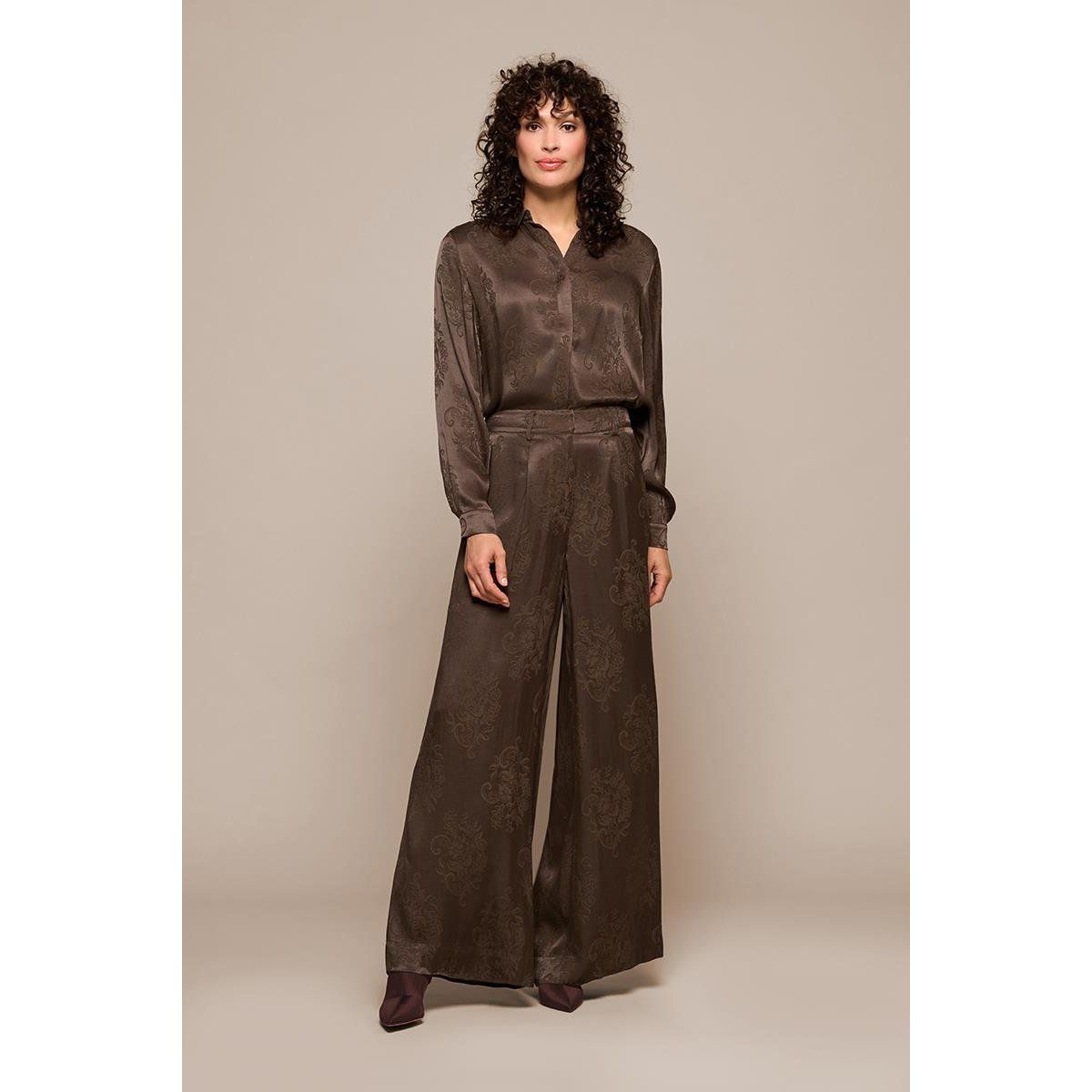 Elegante weit geschnittene Jacquardhose mit Blumenmuster