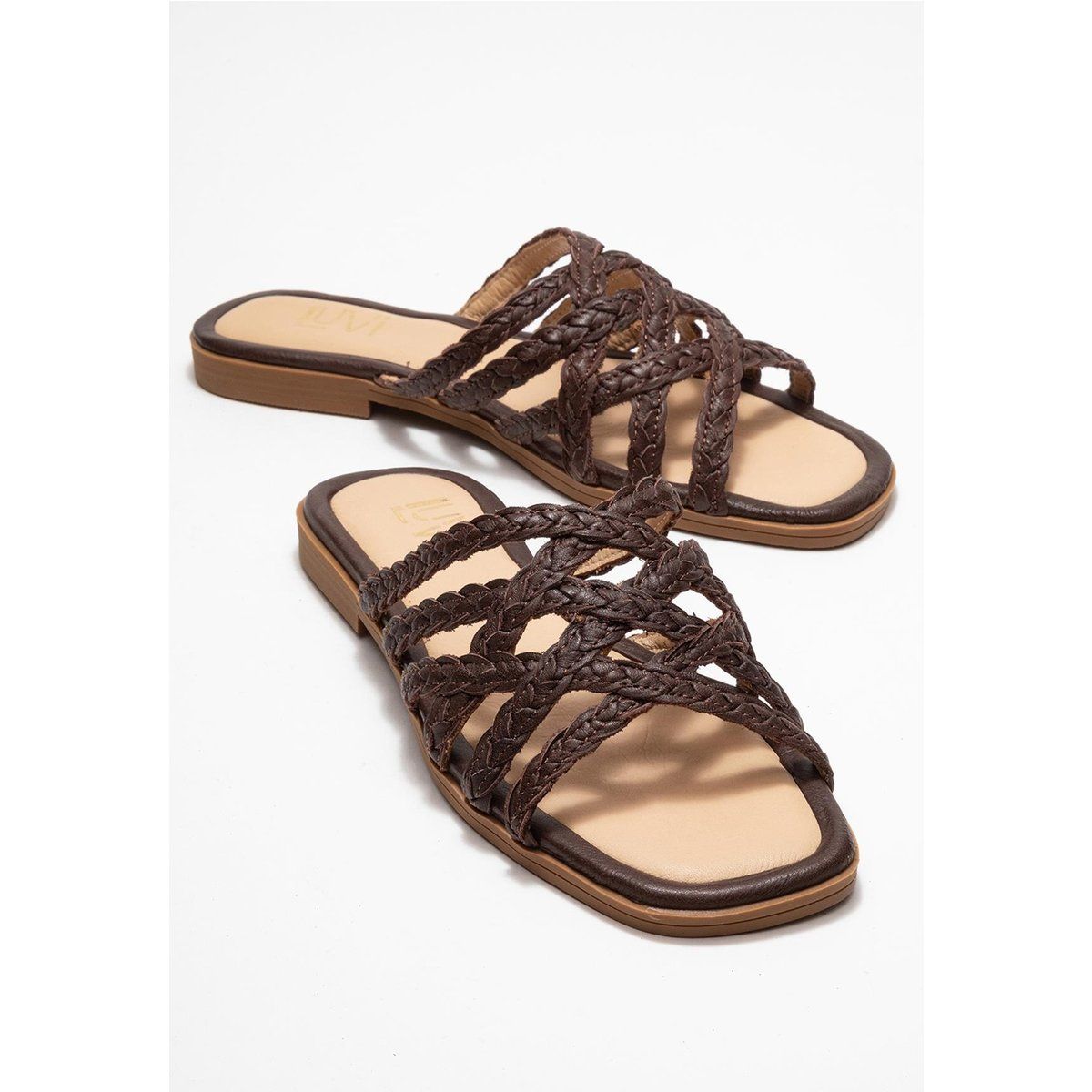 Geflochtene flache Leder-Slide-Sandalen