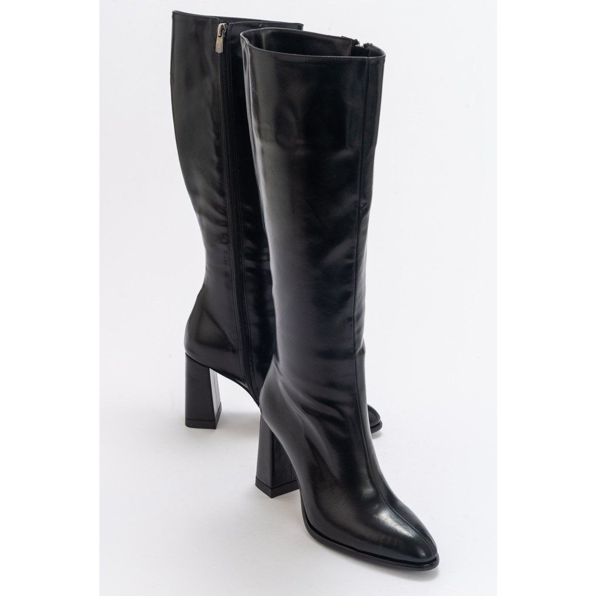 Elegante skulpturale kniehohe Stiefel